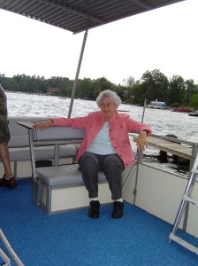 Mom enjoying the breeze on the pontoon boat.