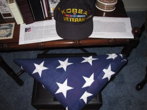 The flag from Dad's funeral. His favorite Korea Veteran cap.