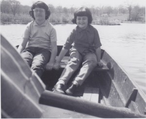 My Dad is rowing my Sister and me.  I think my Brother is taking the picture.