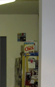 Entenmann's Crumb Cake hidden on top of the refrigerator.